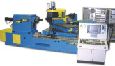 Spécial FORM & TÔLE 2006 : un tour à repousser pour la fabrication de presses jusqu'à 1600 mm de diamètre sur le stand DENN