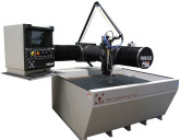 La machine de découpe jet d'eau 5555 d'OMAX offre tous les avantages pour un encombrement minimal