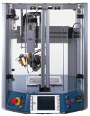 Spécial MOTEK 2003 : le robot de table TR300 de MTA AUTOMATION pour des opérations de micro-soudage point par point ou le micro-dosage de produits visqueux ou liquides
